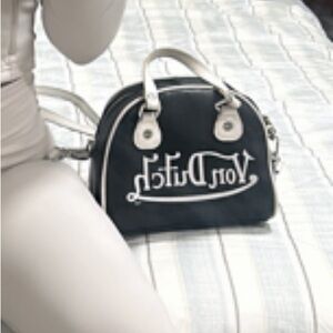 White and black Von Dutch purse